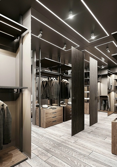 Modern walk-in closet with wooden shelves and mirrors